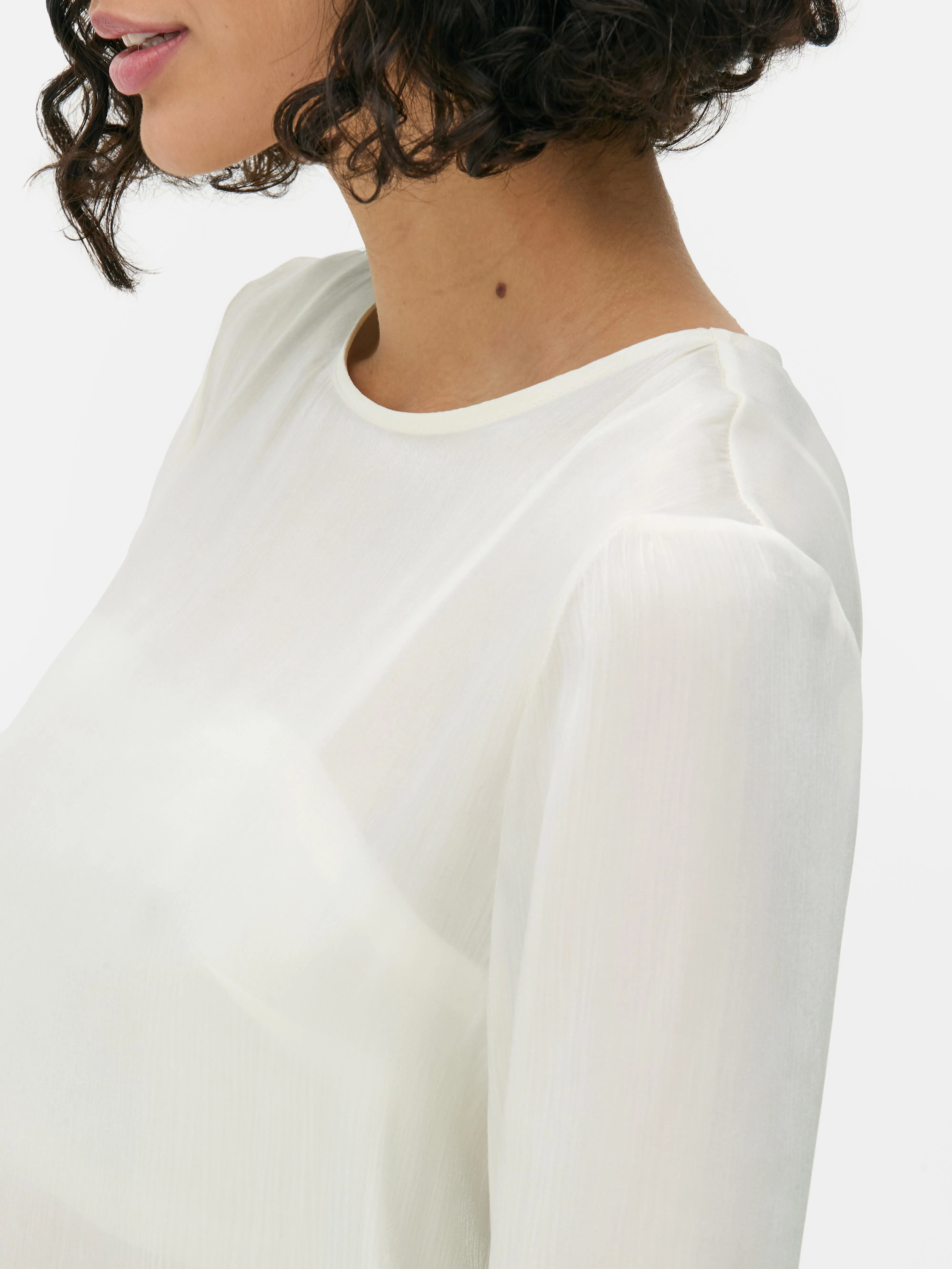 Blusa de manga larga brillante