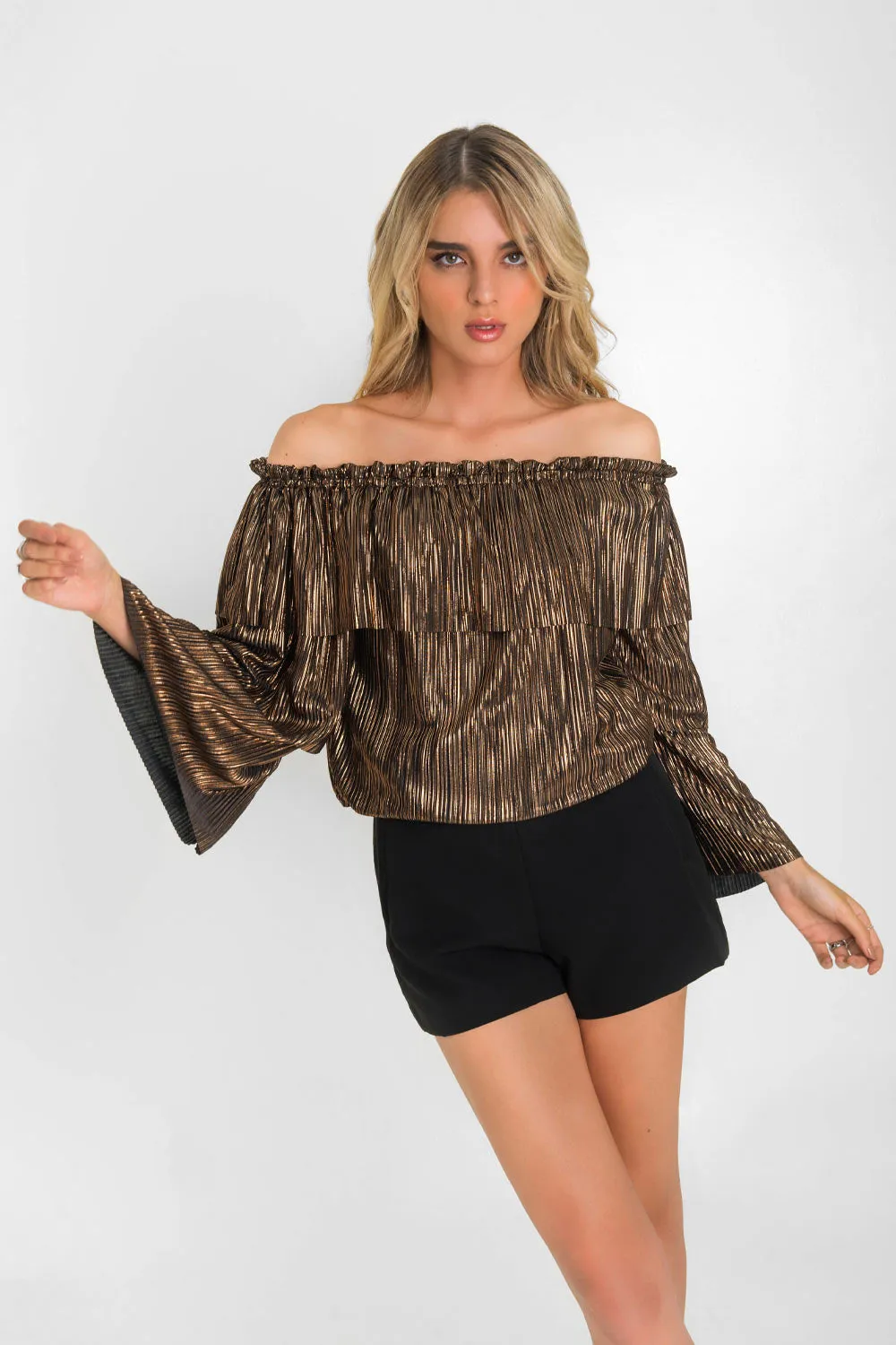 Blusa metálica de manga larga olanes