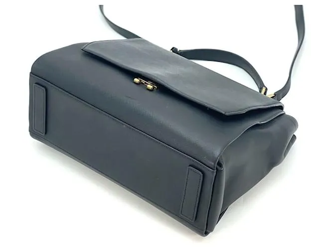 MCM Bolso con asa de cuero Bolso de hombro Bolso de mano negro dorado 