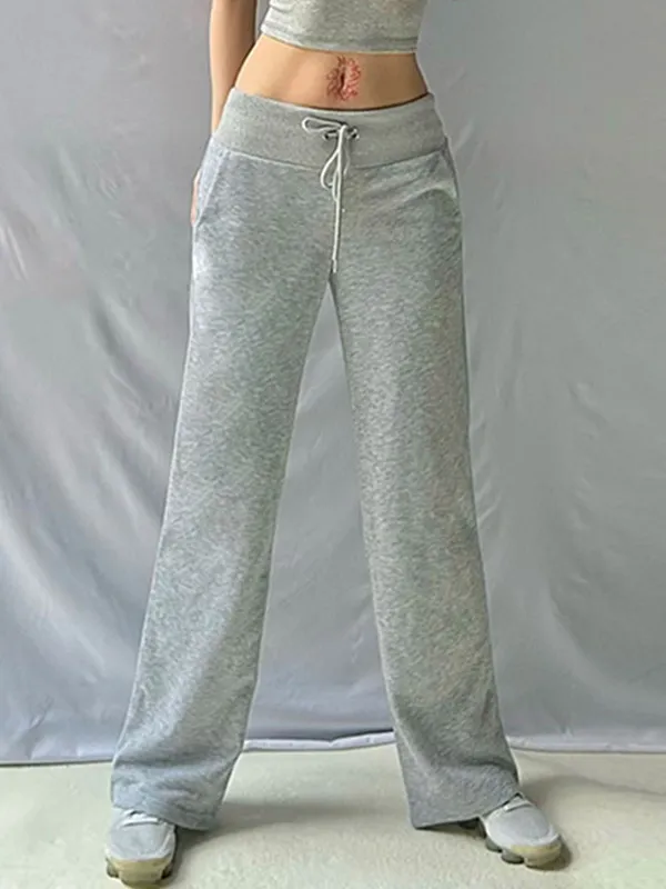 Pantalones acampanados de color liso